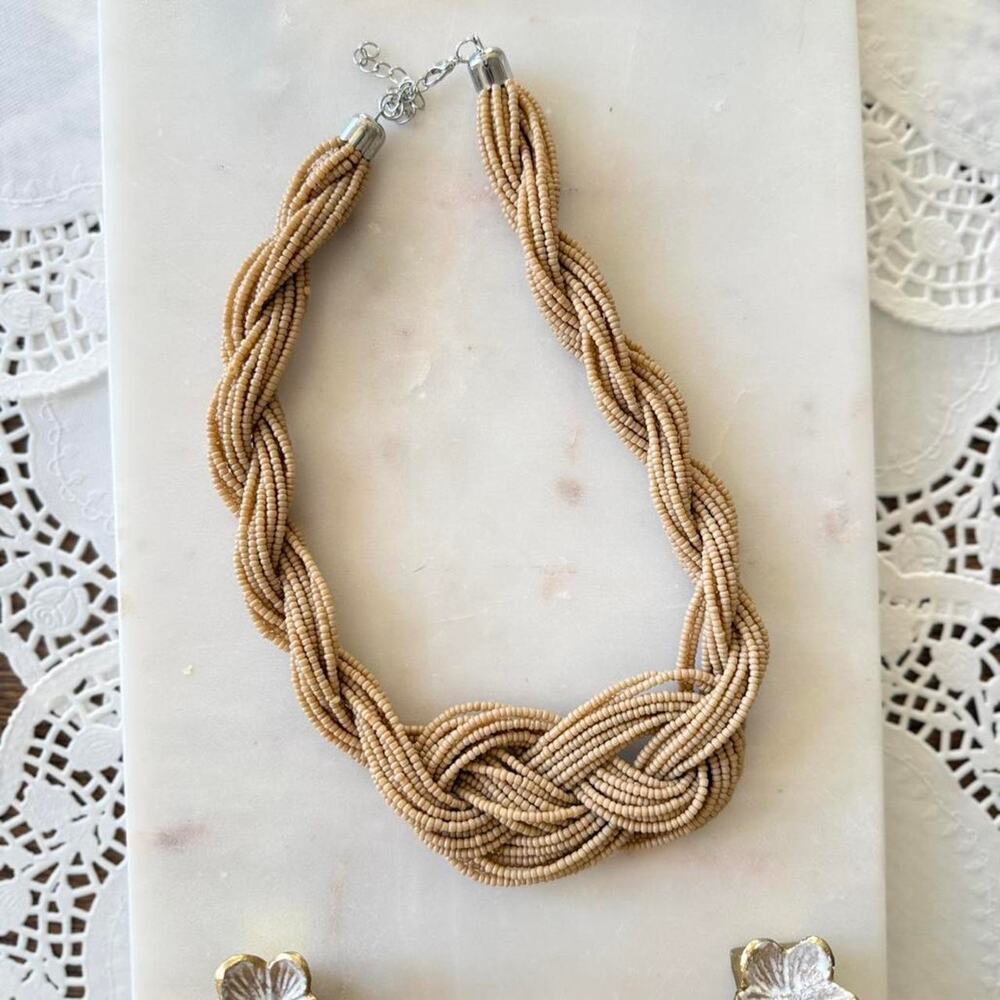 A timeless and elegant braided statement necklace, pre-loved, brown tan